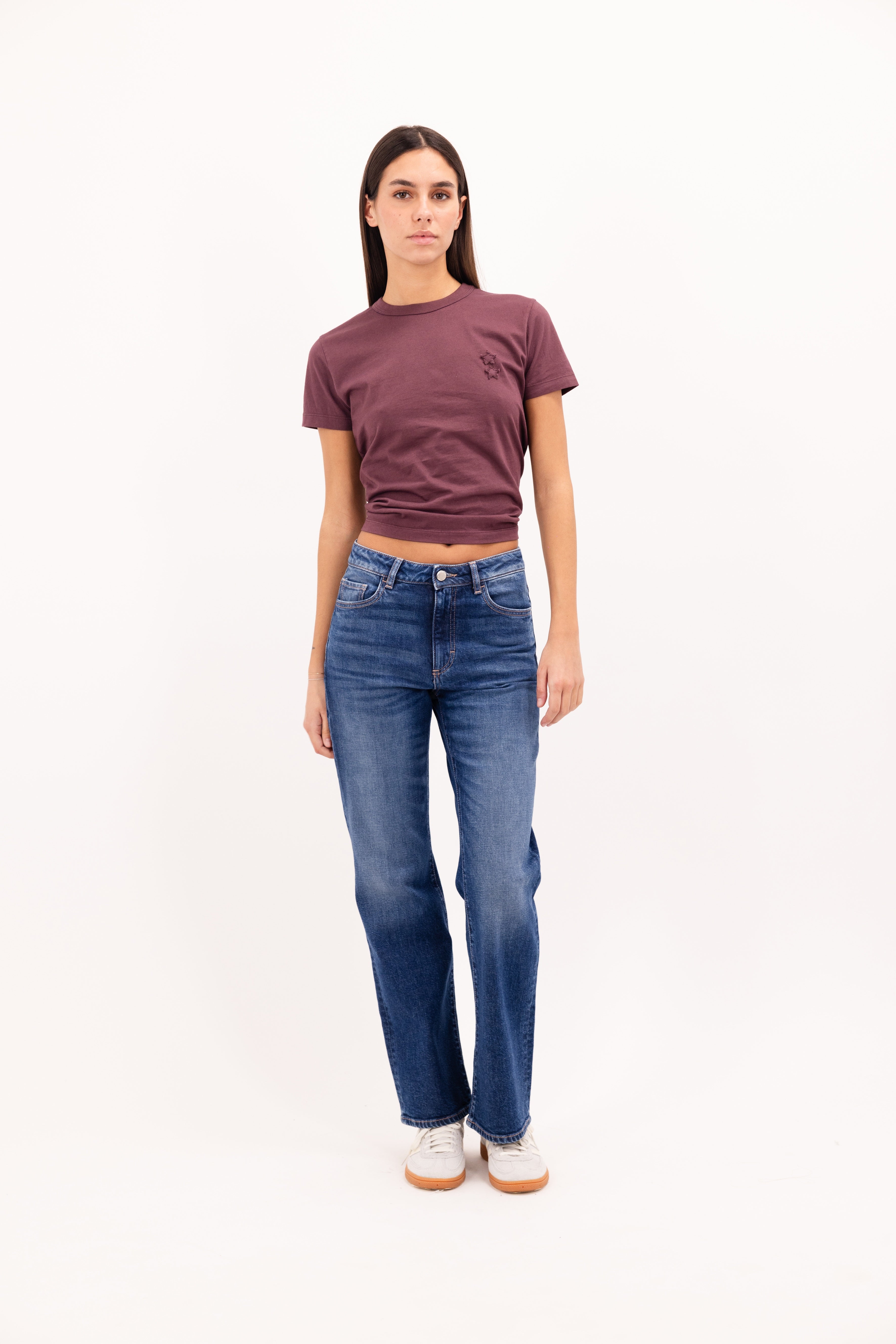 Julie women’s t-shirt in cherry, 100% cotton, worn by a model with jeans.