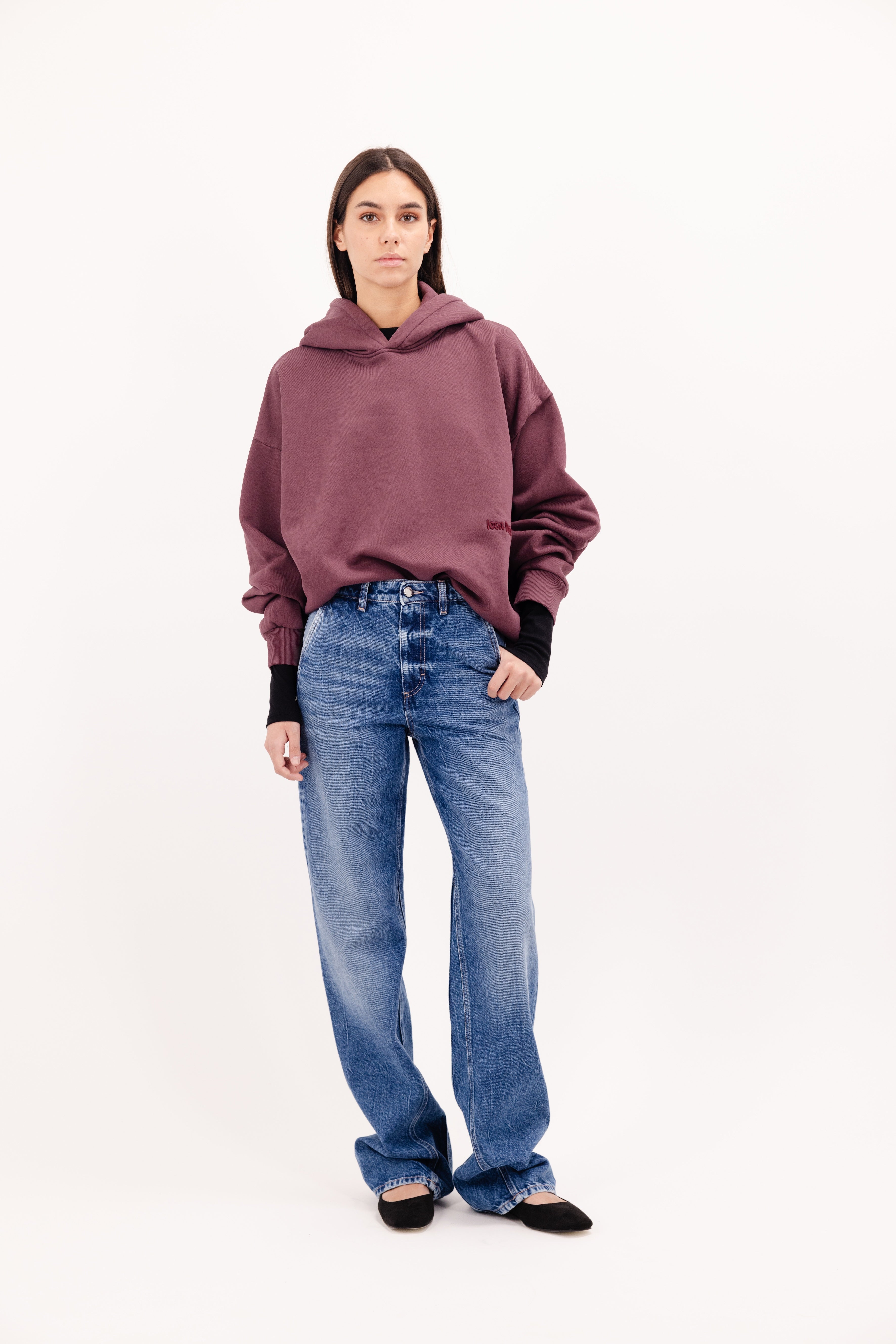 Annie women’s straight leg jeans in eclipse wash, 100% rigid cotton denim, worn by a model with a cherry sweatshirt.