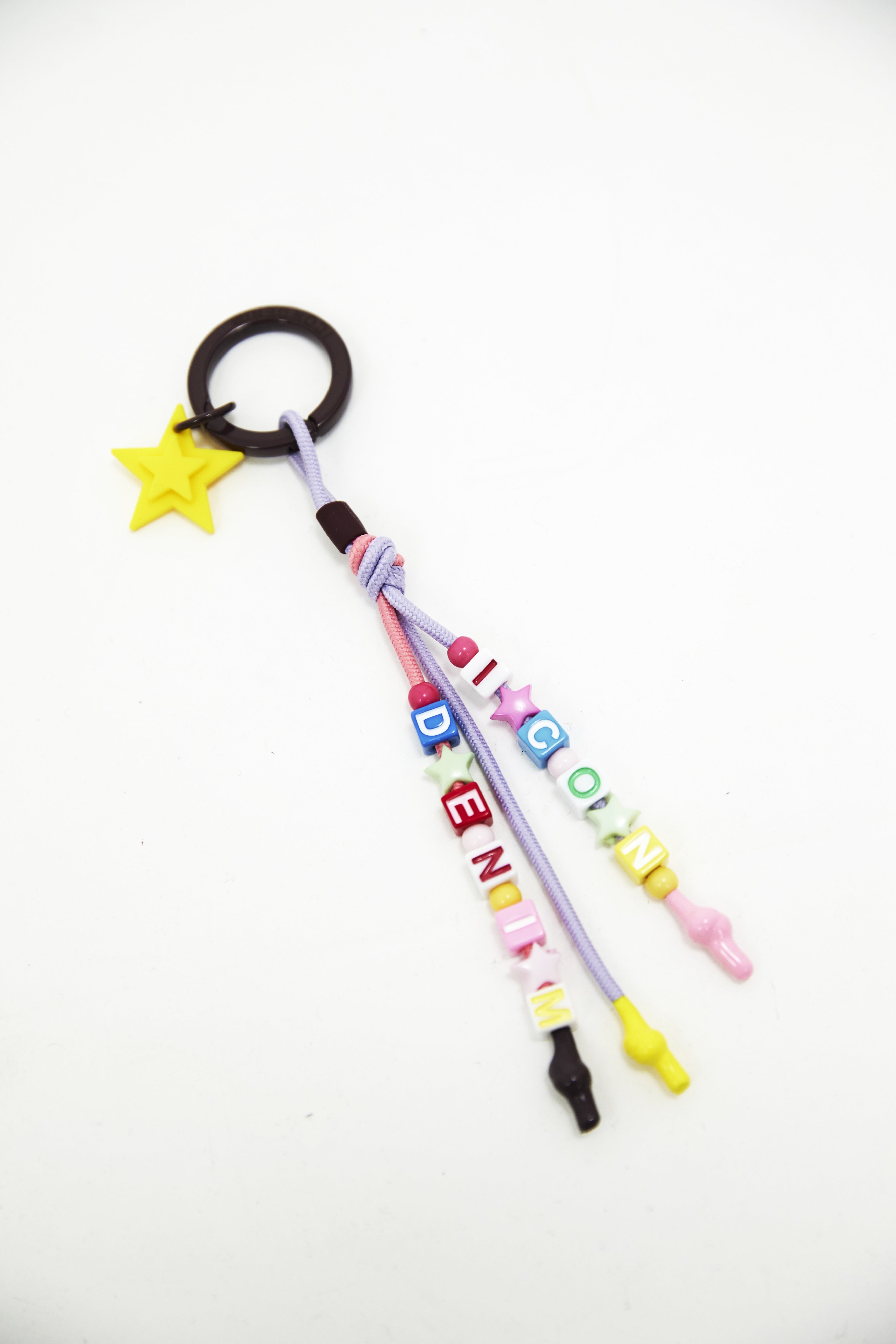 Cyrus keychain to attach to your denim or bag, wherever you are headed.