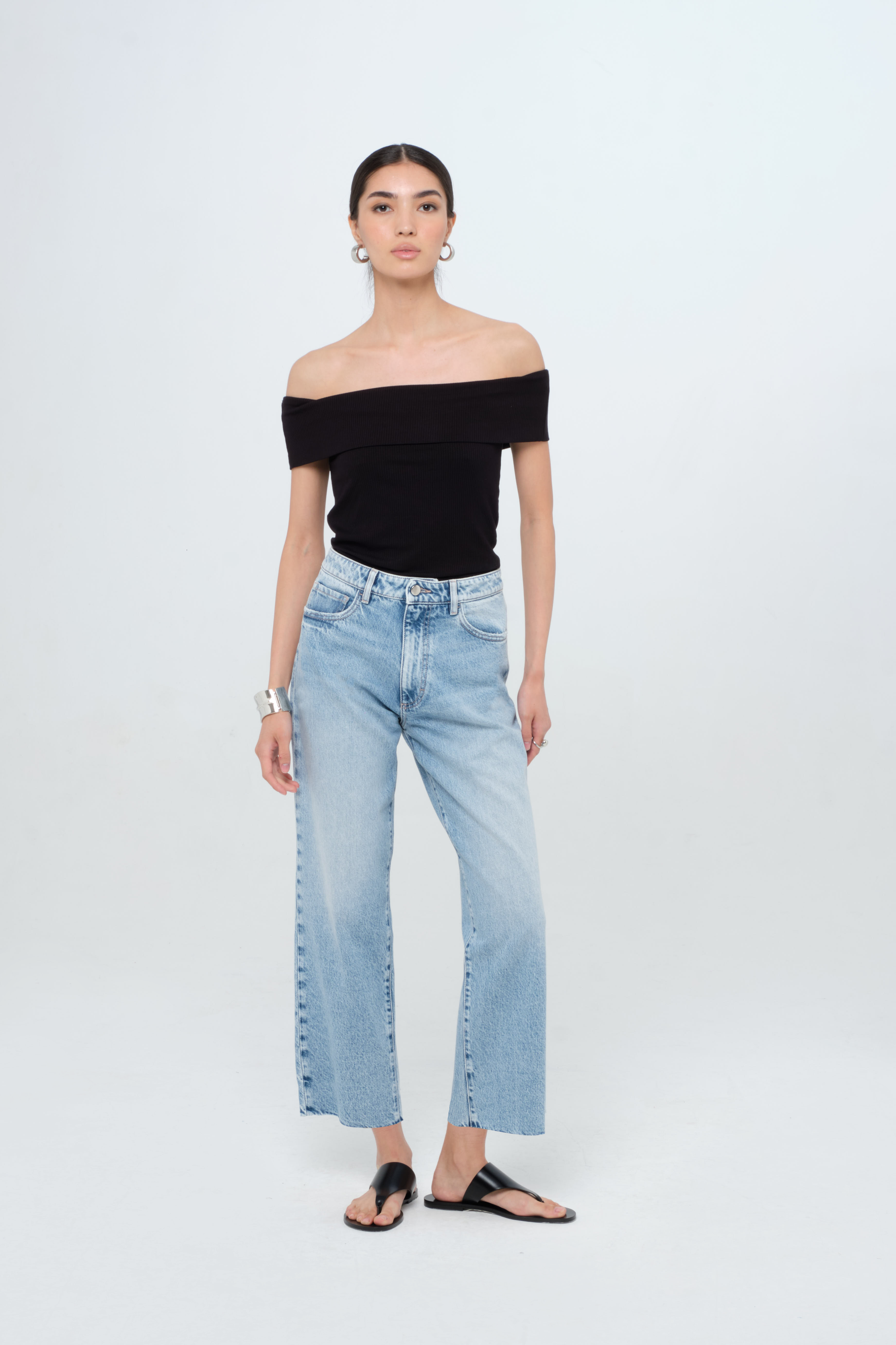 Jill women’s straight leg jeans in light wash, 100% rigid cotton denim, worn by a model with a black top.