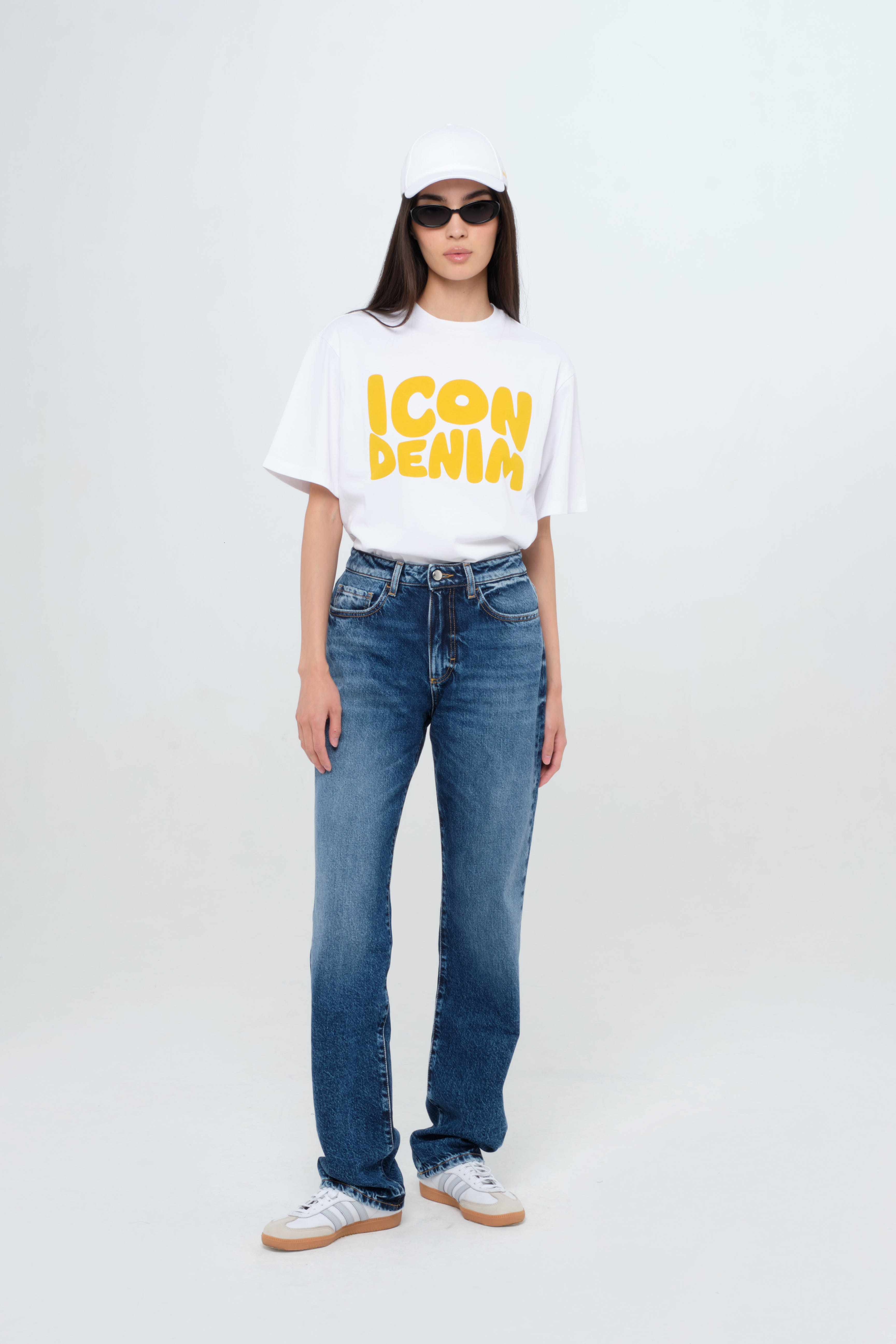 Skye women’s regular jeans in dark wash, 100% rigid cotton denim, worn by a model with a white t-shirt.
