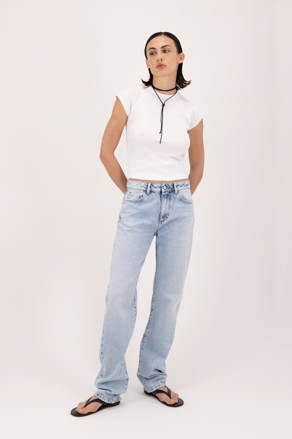 Skye women’s regular jeans in sky blue wash, 100% rigid cotton denim, worn by a model with a white t-shirt.