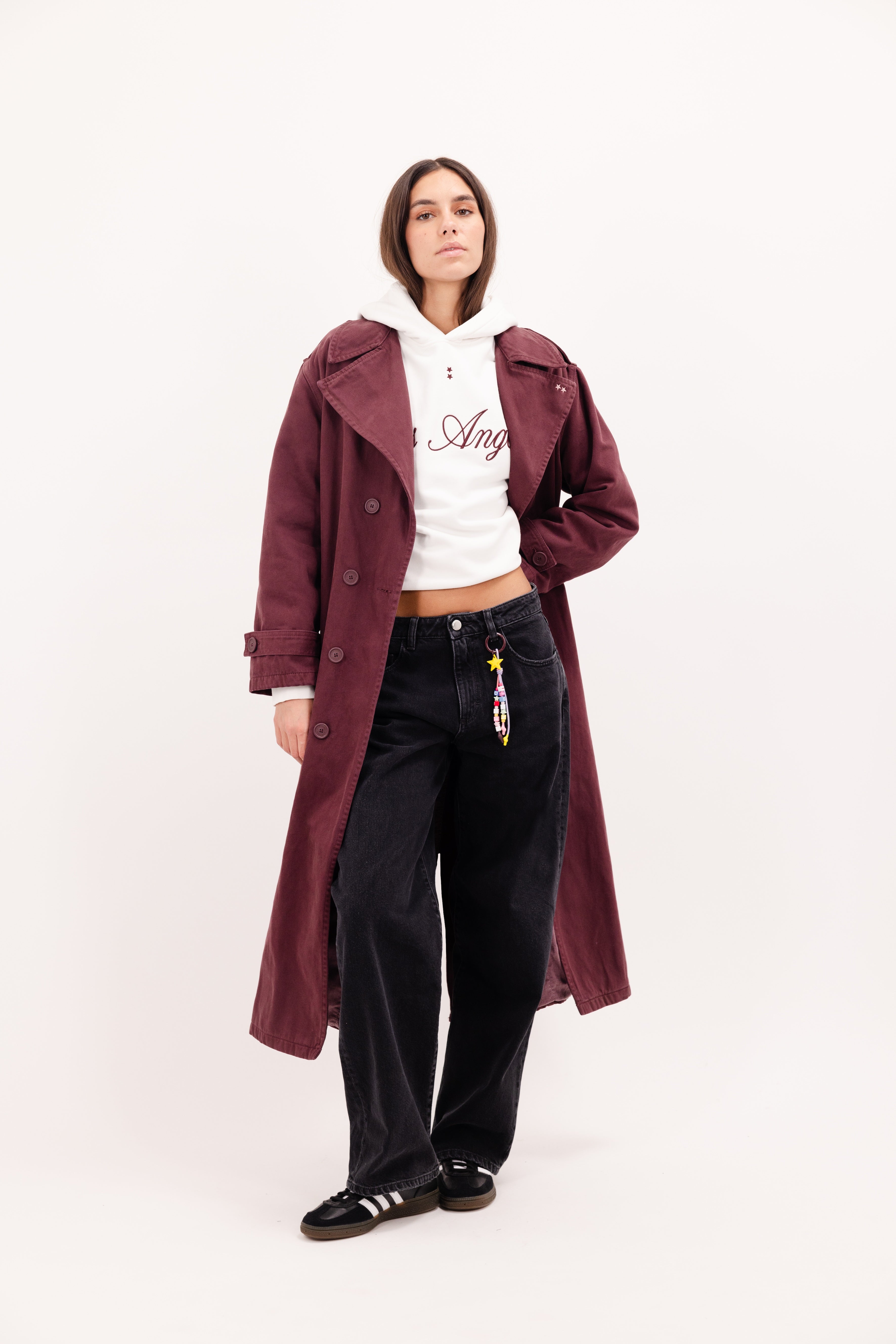Snow women’s oversize coat in cherry, 100% rigid cotton denim, worn by a model with jeans.